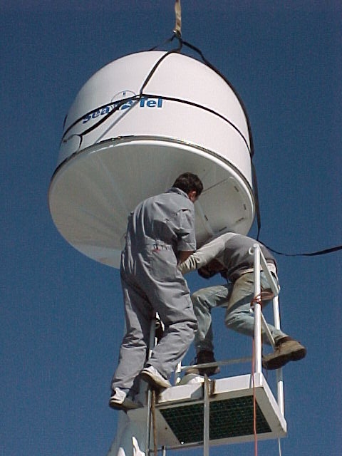 Naval field engineer installing Satellite TV Antenna